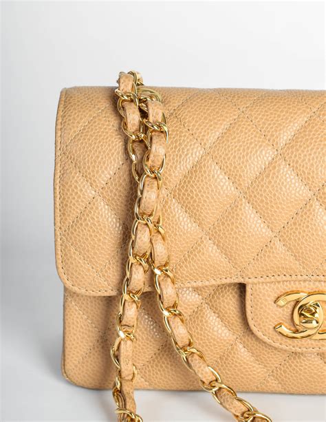 small chanel o pouch beige|Chanel small bag with chain.